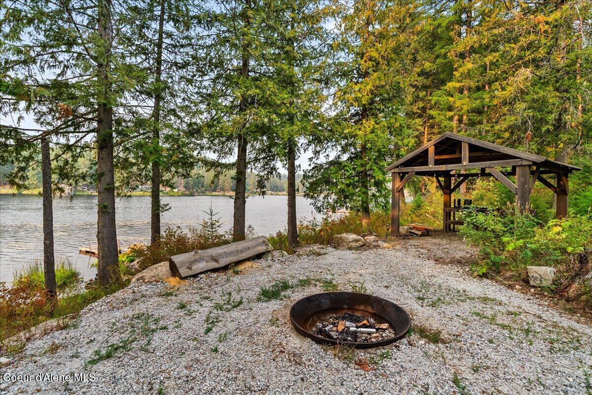 529 South Beaver Lake Road Athol, ID 83801 - Photo 78 of 85 Firepit and water