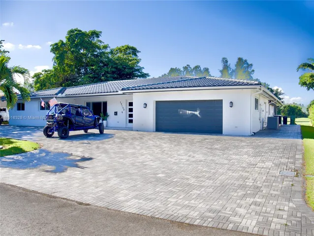 a view of a house with a patio