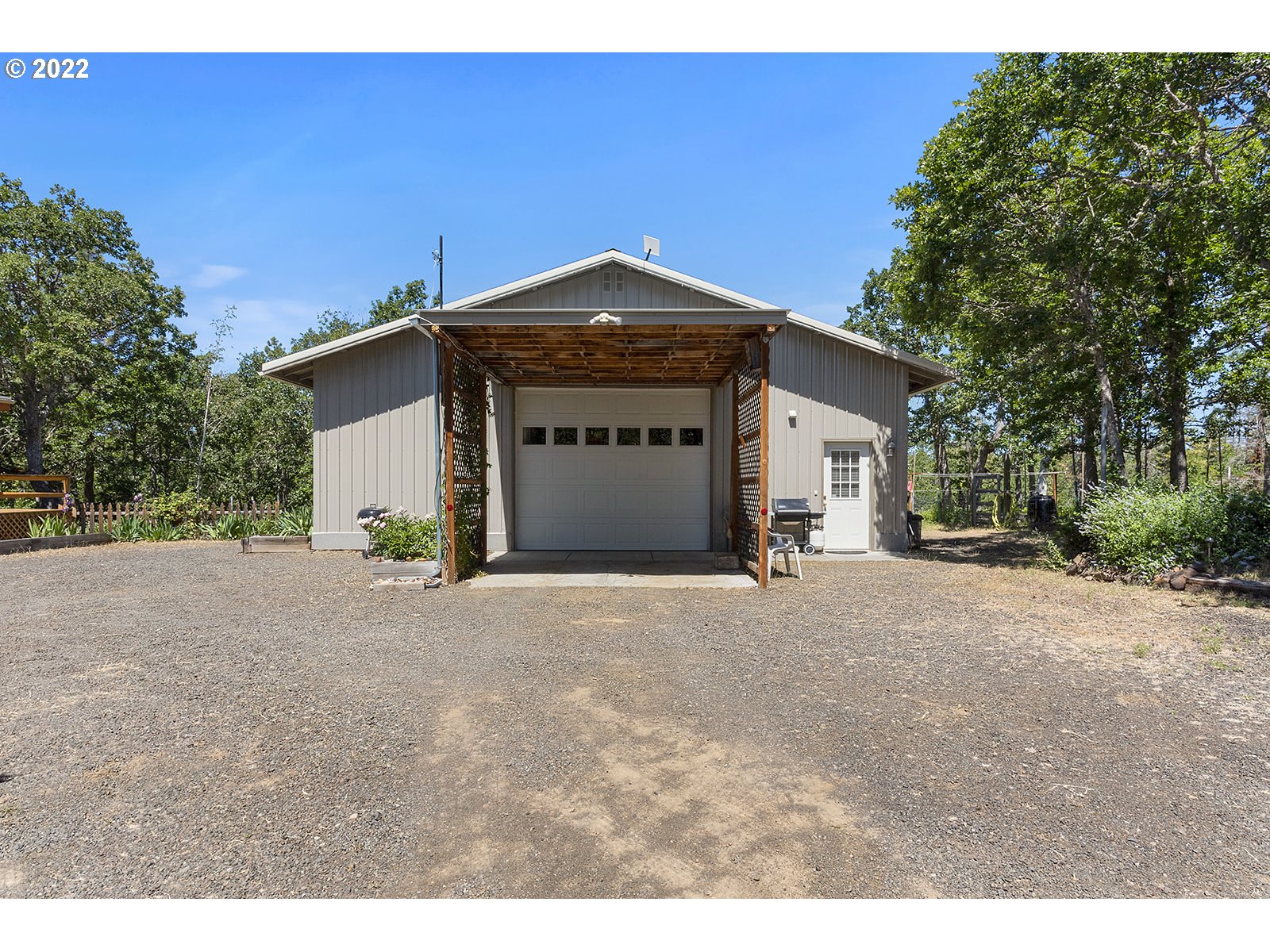 45 Buck Lane Goldendale, WA 98620 - Photo 15 of 32 a front view of a house with a yard and garage
