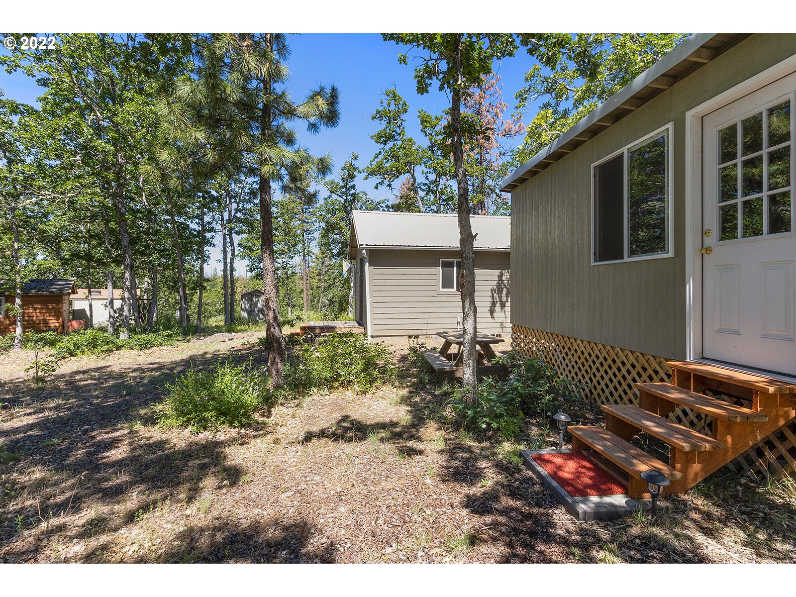 45 Buck Lane Goldendale, WA 98620 - Photo 21 of 32 a backyard of a house with lots of green space