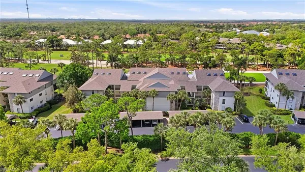 an aerial view of a house with a garden