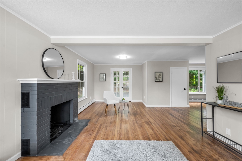 37 Bridge Street Monson, MA 01057 - Photo 25 of 35 a living room with furniture and a fireplace