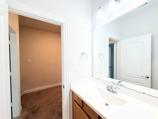 a room with a bed and a window