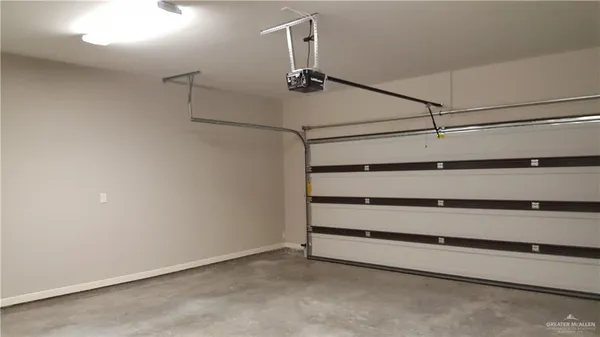 a view of closet area with empty racks