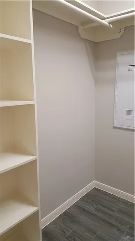 a view of an empty walk in closet