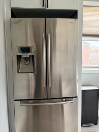 a close view of a refrigerator in kitchen