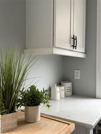 a bathroom with a sink a toilet and bathtub