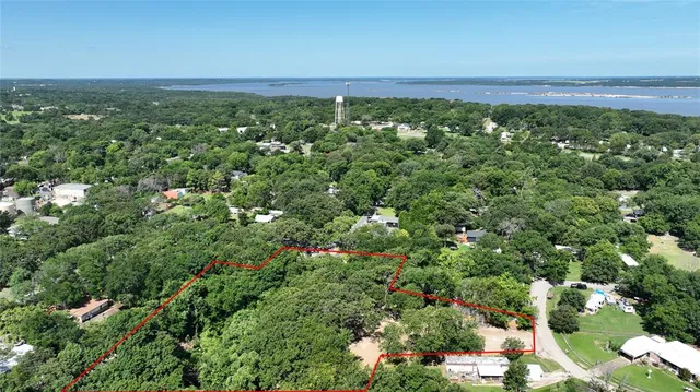 a view of a lake with a city