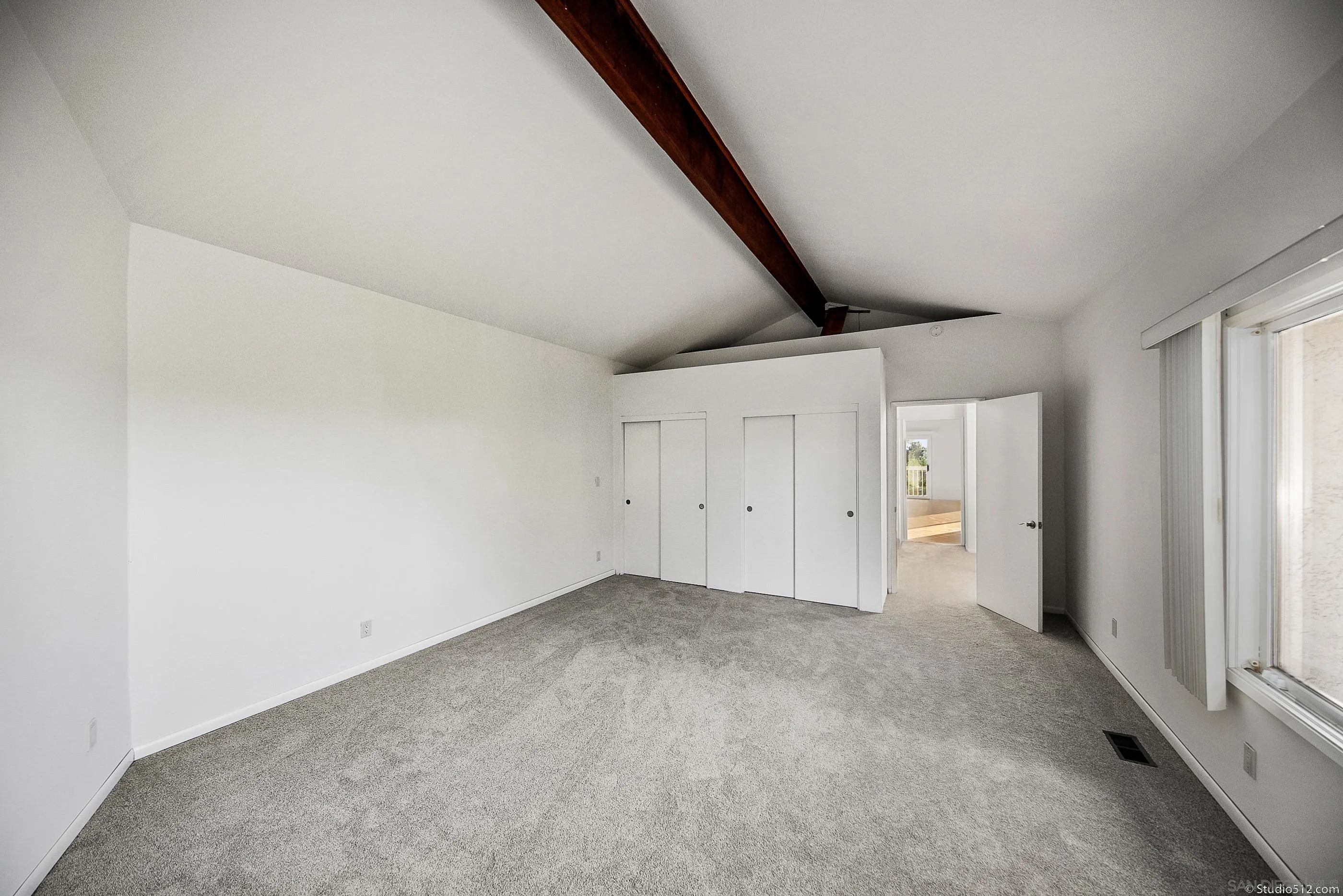 1112 Oceanic Drive Encinitas, CA 92024 - Photo 22 of 32 an empty room with windows