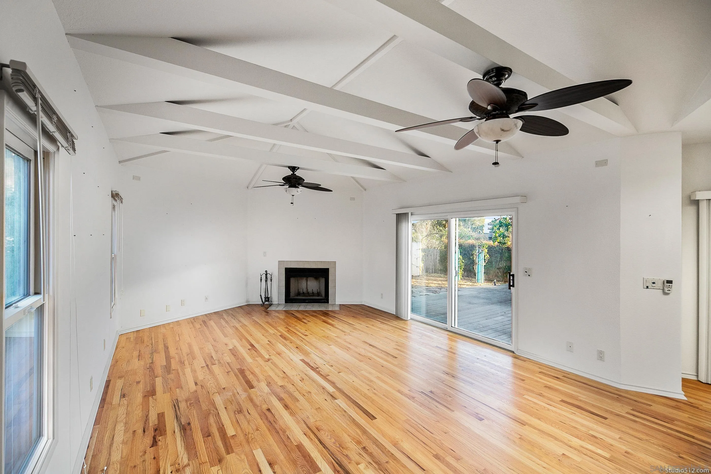 1112 Oceanic Drive Encinitas, CA 92024 - Photo 4 of 32 wooden floor in an empty room with a window
