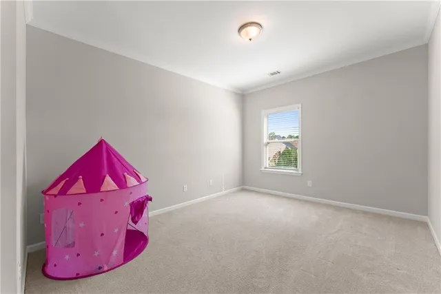a view of a hallway with staircase