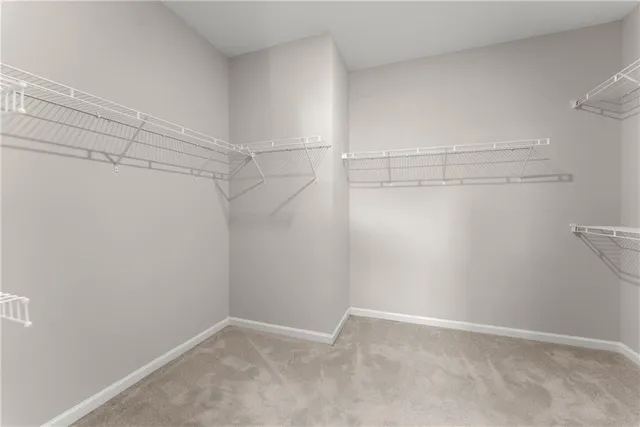 a view of room with wooden floor