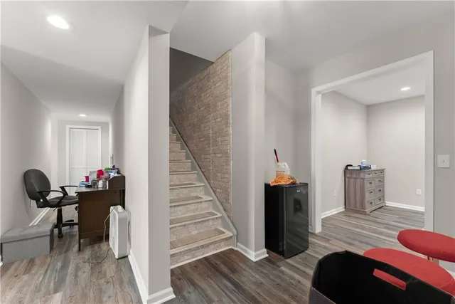 a bathroom with a sink vanity and a mirror