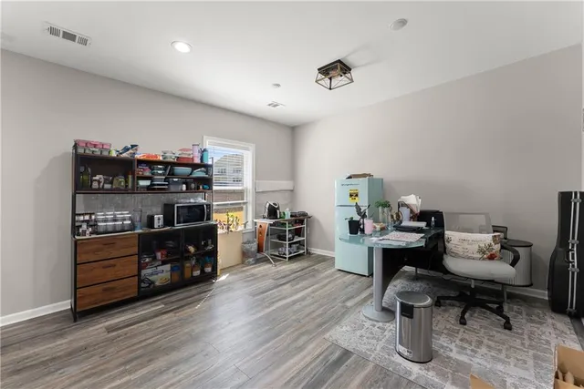 a view of a house with a snow on the road