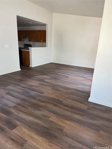 a kitchen with a sink appliances and cabinets