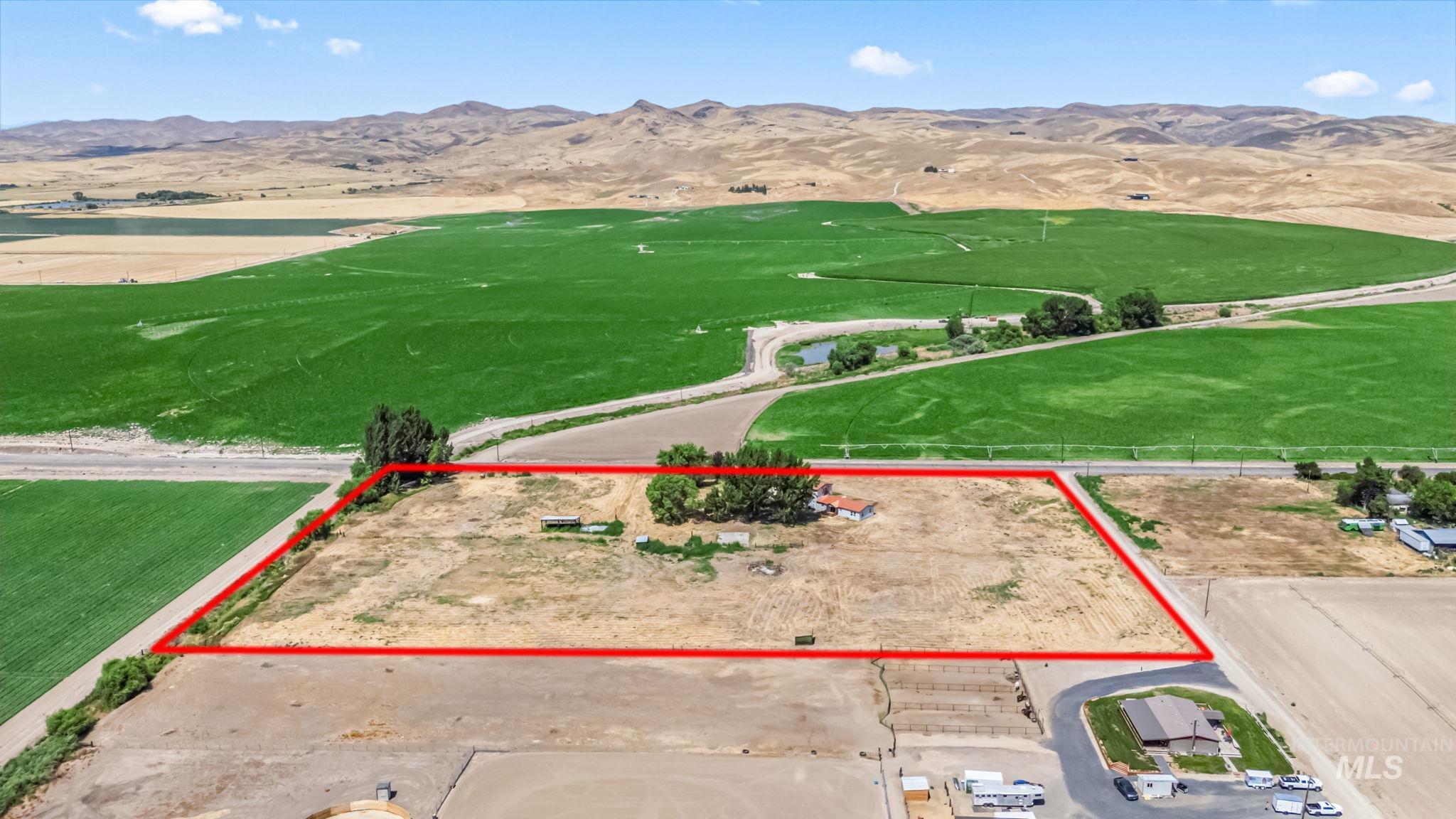 1117 Olds Ferry Road Weiser, ID 83672 - Photo 11 of 36 Aerial view of sparsely populated area featuring mountains and property boundaries highlighted