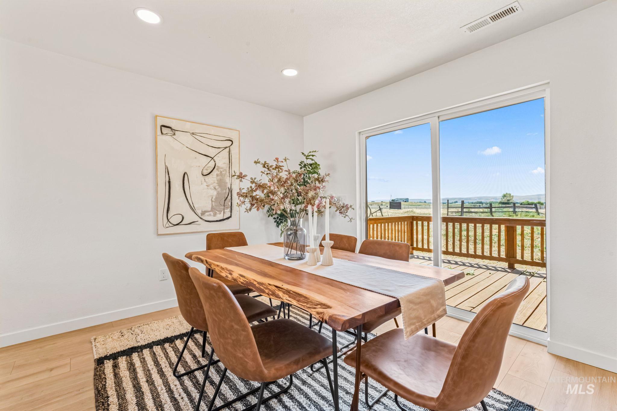 1117 Olds Ferry Road Weiser, ID 83672 - Photo 17 of 36 Dining area featuring light wood-type flooring and recessed lighting