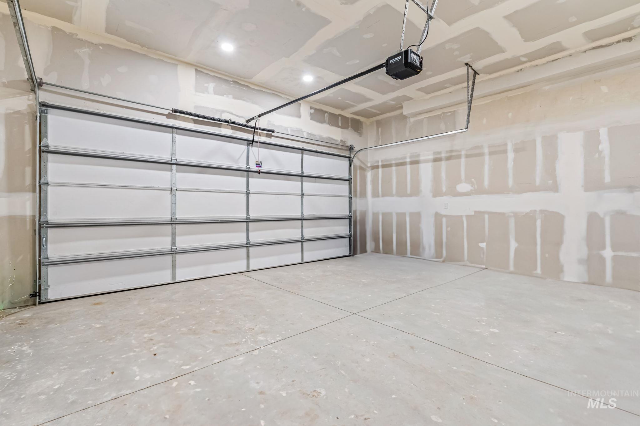 1117 Olds Ferry Road Weiser, ID 83672 - Photo 28 of 36 Garage featuring a garage door opener