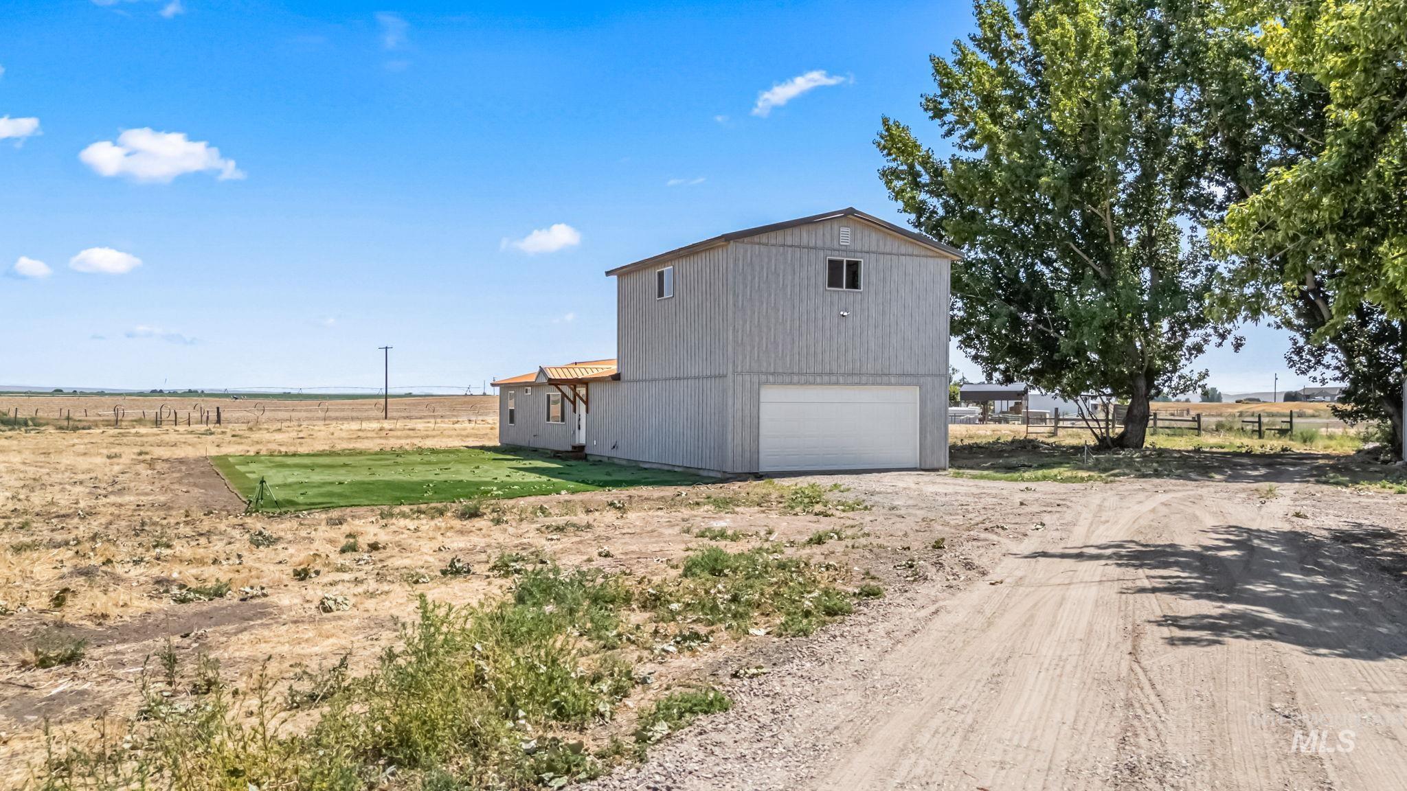 1117 Olds Ferry Road Weiser, ID 83672 - Photo 4 of 36 View of side of property featuring a view of rural / pastoral area and dirt driveway