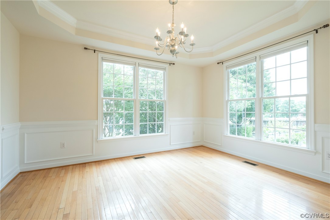 4917 Chappell Ridge Terrace Glen Allen, VA 23059 - Photo 11 of 50 a view of an empty room with a window and wooden floor