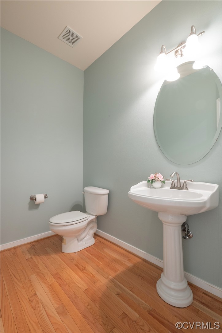 4917 Chappell Ridge Terrace Glen Allen, VA 23059 - Photo 12 of 50 a bathroom with a sink toilet and a mirror