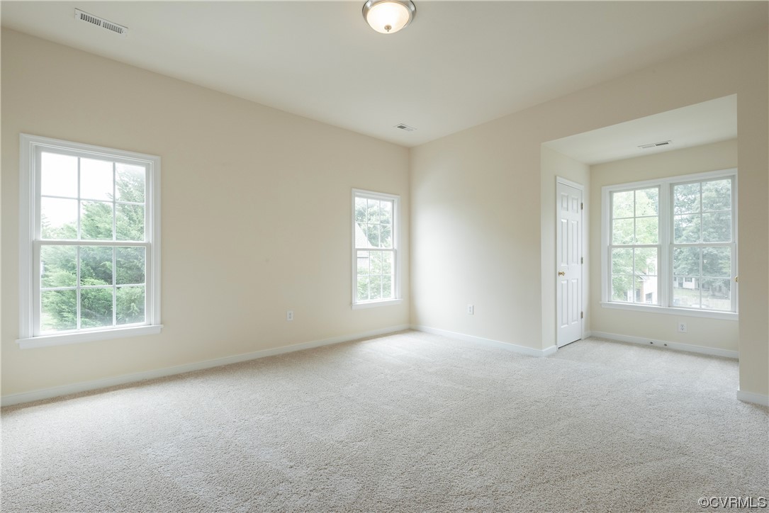 4917 Chappell Ridge Terrace Glen Allen, VA 23059 - Photo 27 of 50 a view of a big room with windows and chandelier fan