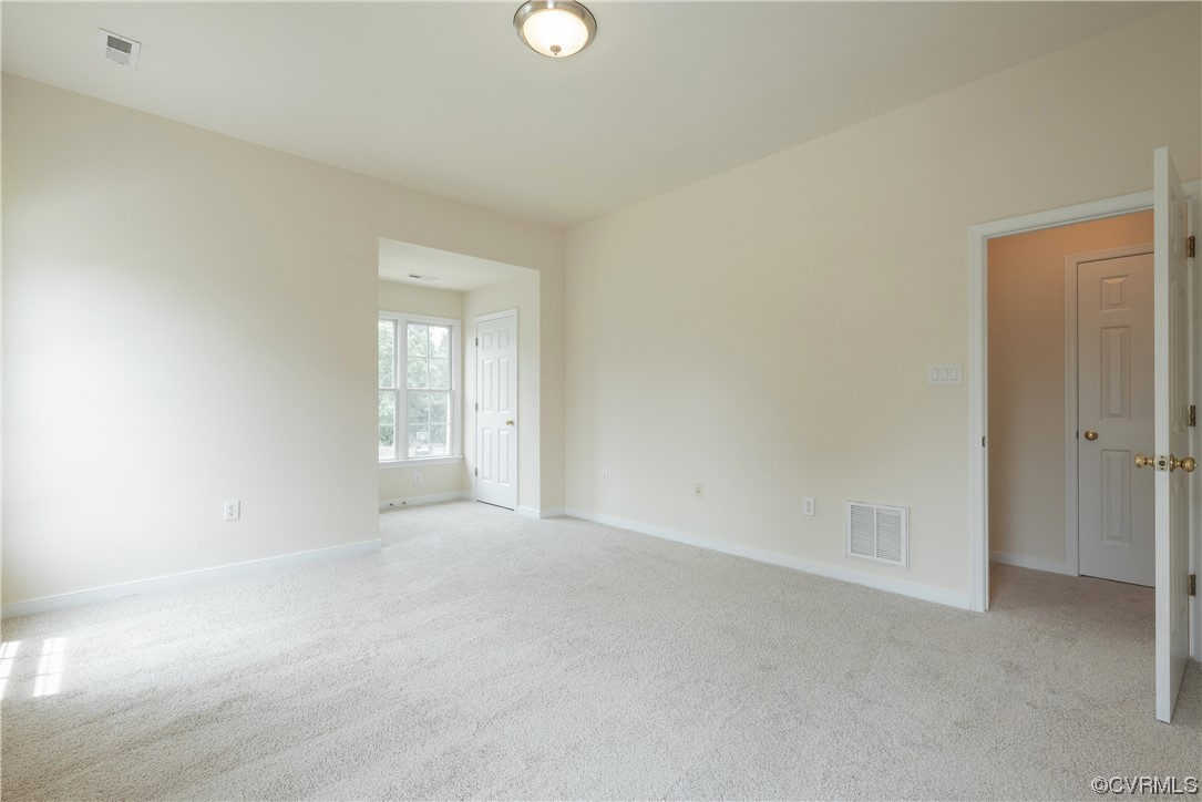 4917 Chappell Ridge Terrace Glen Allen, VA 23059 - Photo 28 of 50 a view of an empty room with a window