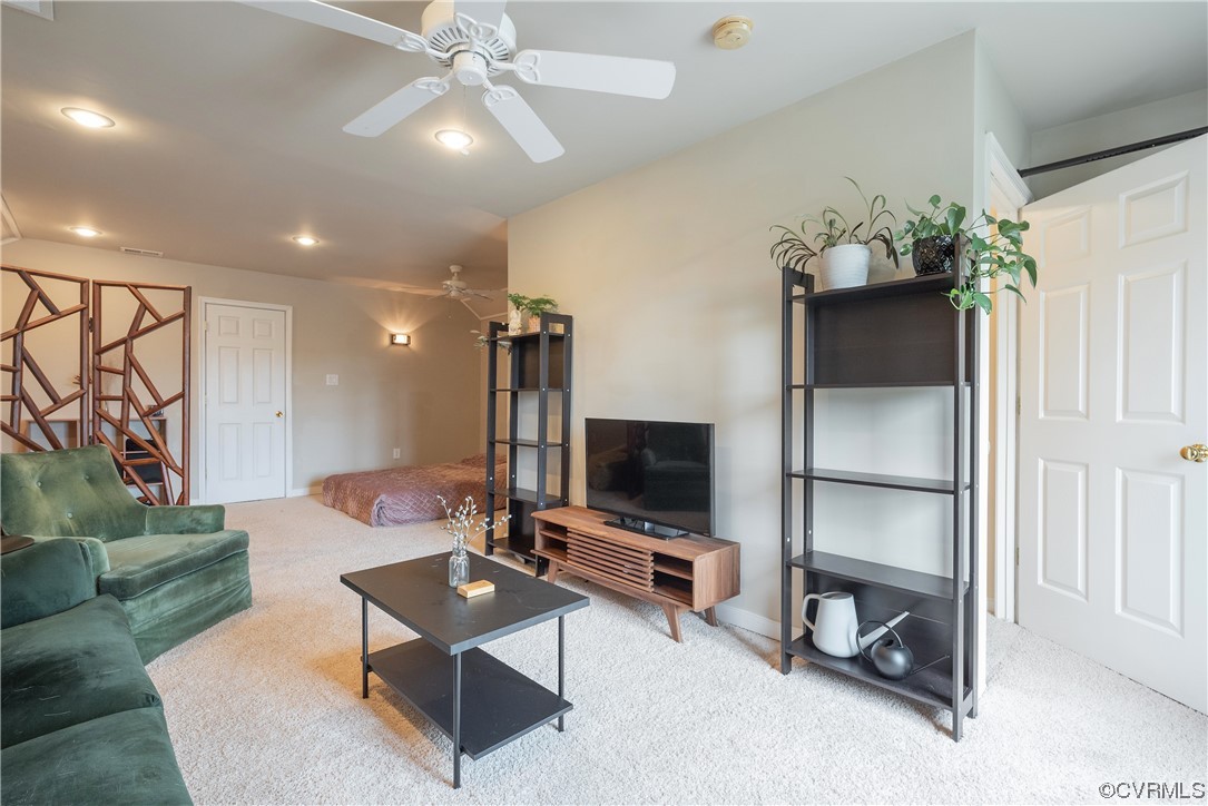 4917 Chappell Ridge Terrace Glen Allen, VA 23059 - Photo 41 of 50 a living room with furniture and a flat screen tv