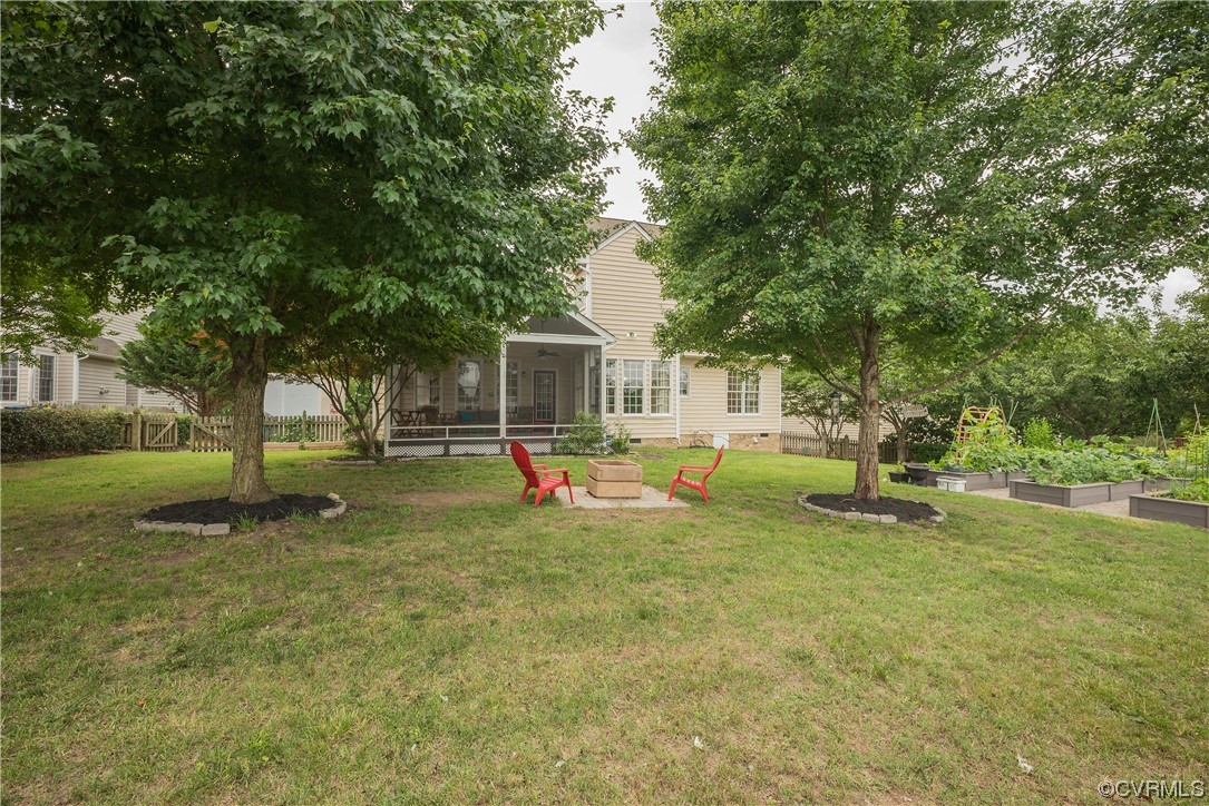 4917 Chappell Ridge Terrace Glen Allen, VA 23059 - Photo 49 of 50 a view of a house with a backyard and a tree