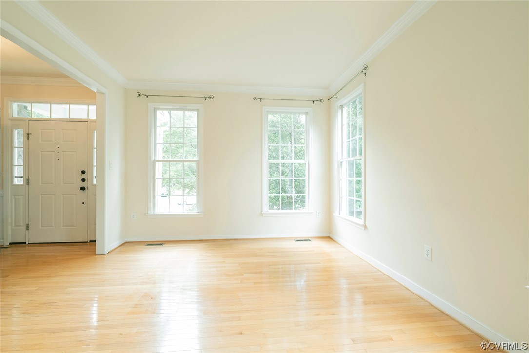 4917 Chappell Ridge Terrace Glen Allen, VA 23059 - Photo 6 of 50 a view of an empty room with a window
