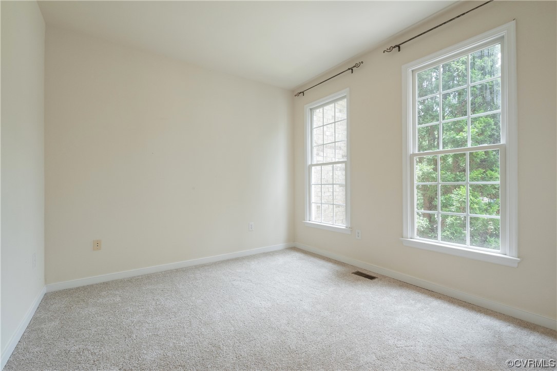 4917 Chappell Ridge Terrace Glen Allen, VA 23059 - Photo 8 of 50 an empty room with a window