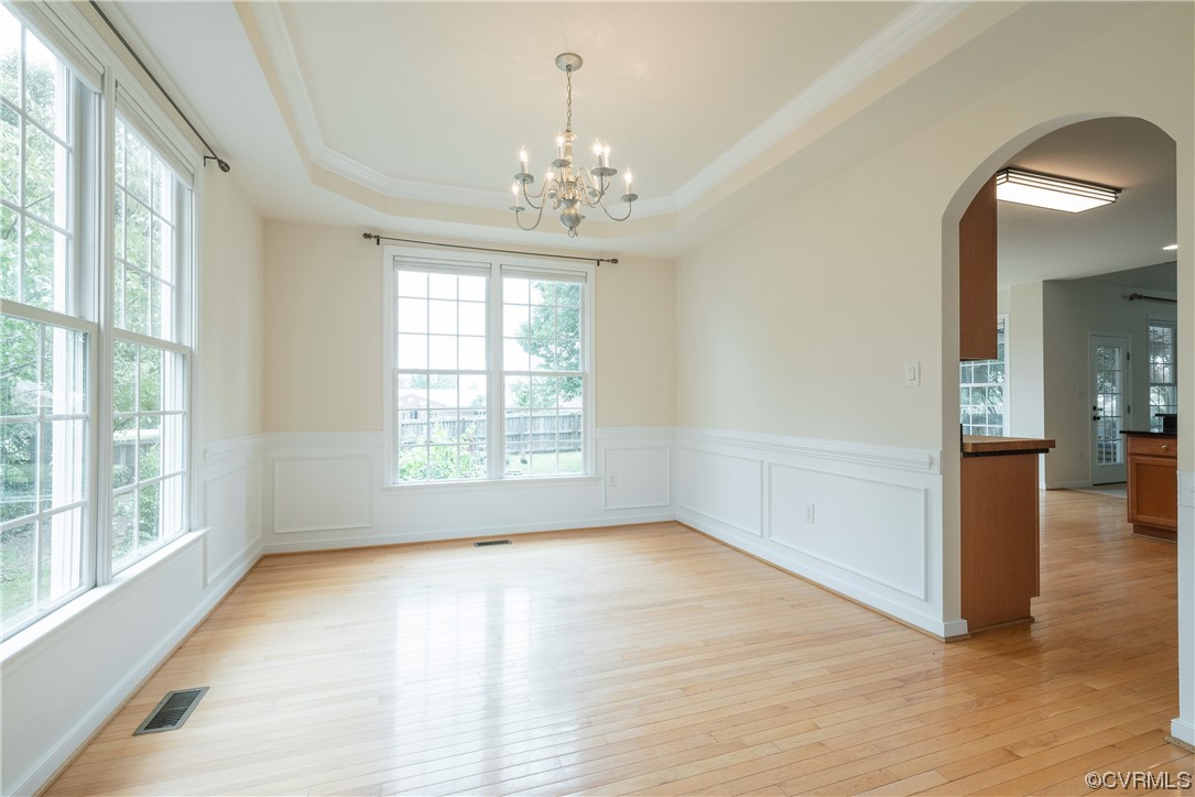 4917 Chappell Ridge Terrace Glen Allen, VA 23059 - Photo 10 of 50 a view of an empty room with window and wooden floor