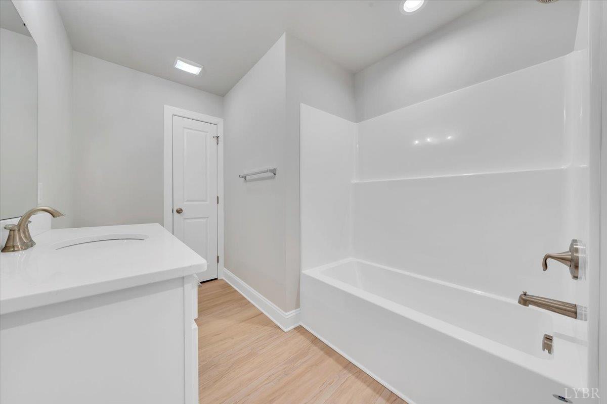 4715 Boonsboro Road Lynchburg, VA 24503 - Photo 22 of 28 a bathroom with a bathtub and a sink