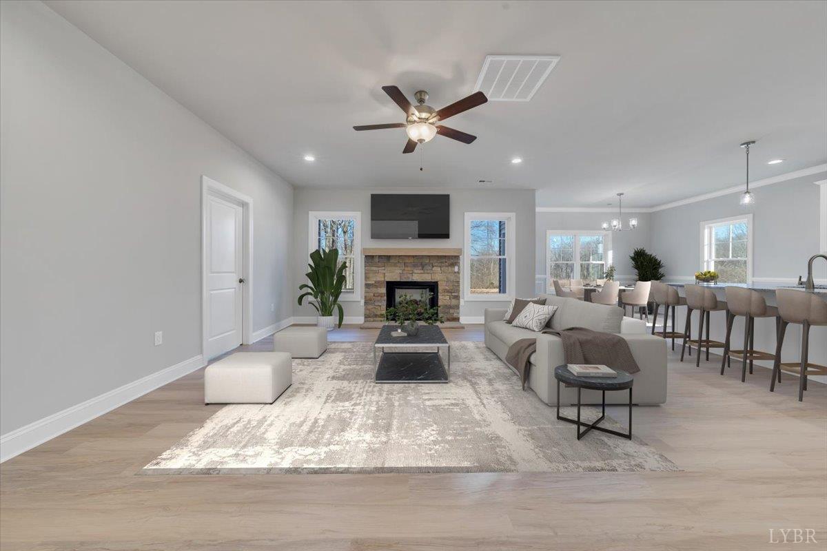 4715 Boonsboro Road Lynchburg, VA 24503 - Photo 5 of 28 a living room with furniture fireplace and a window