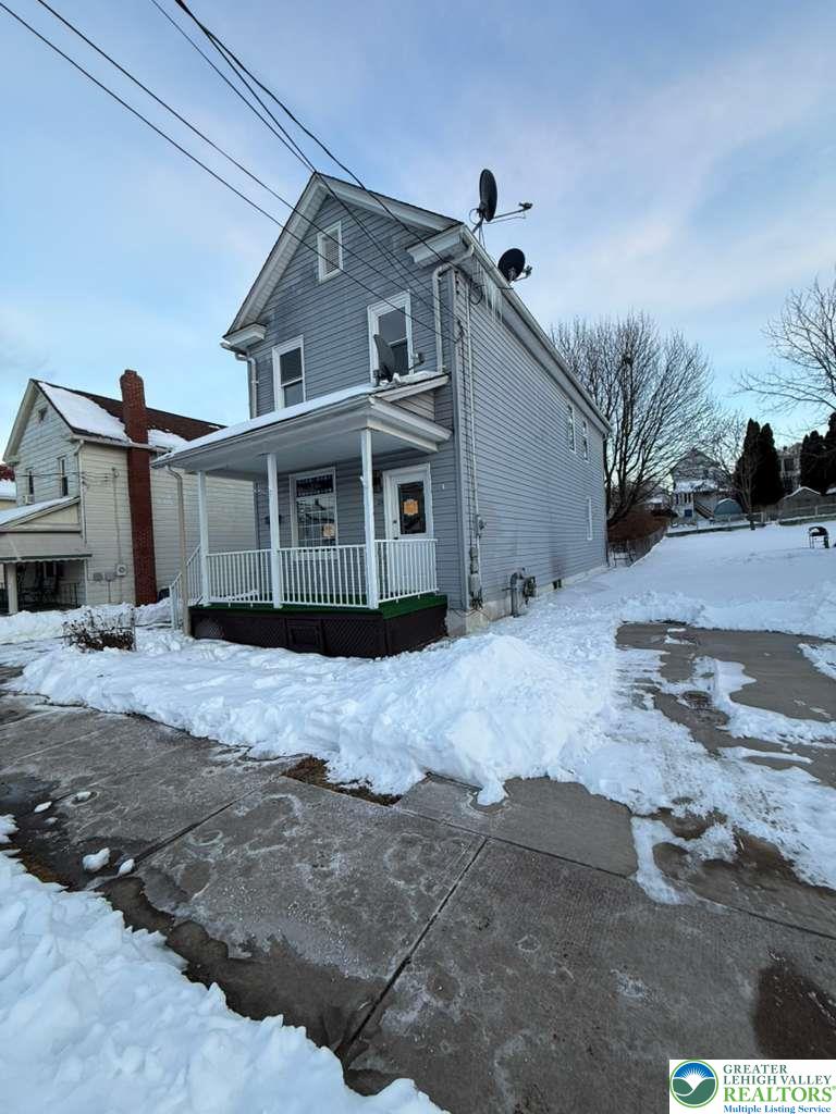 25 West Grove Street Nanticoke, PA 18634 - Photo 2 of 19 a front view of a house with a yard