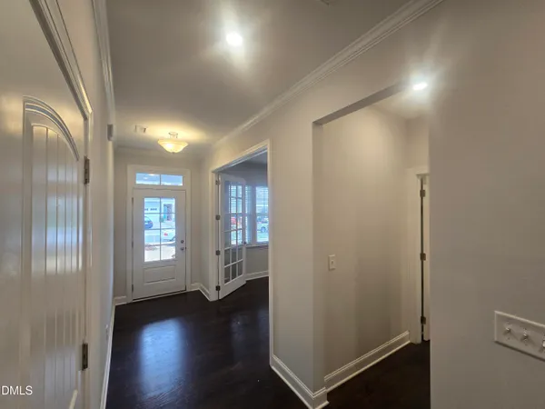 a view of entryway with livingroom