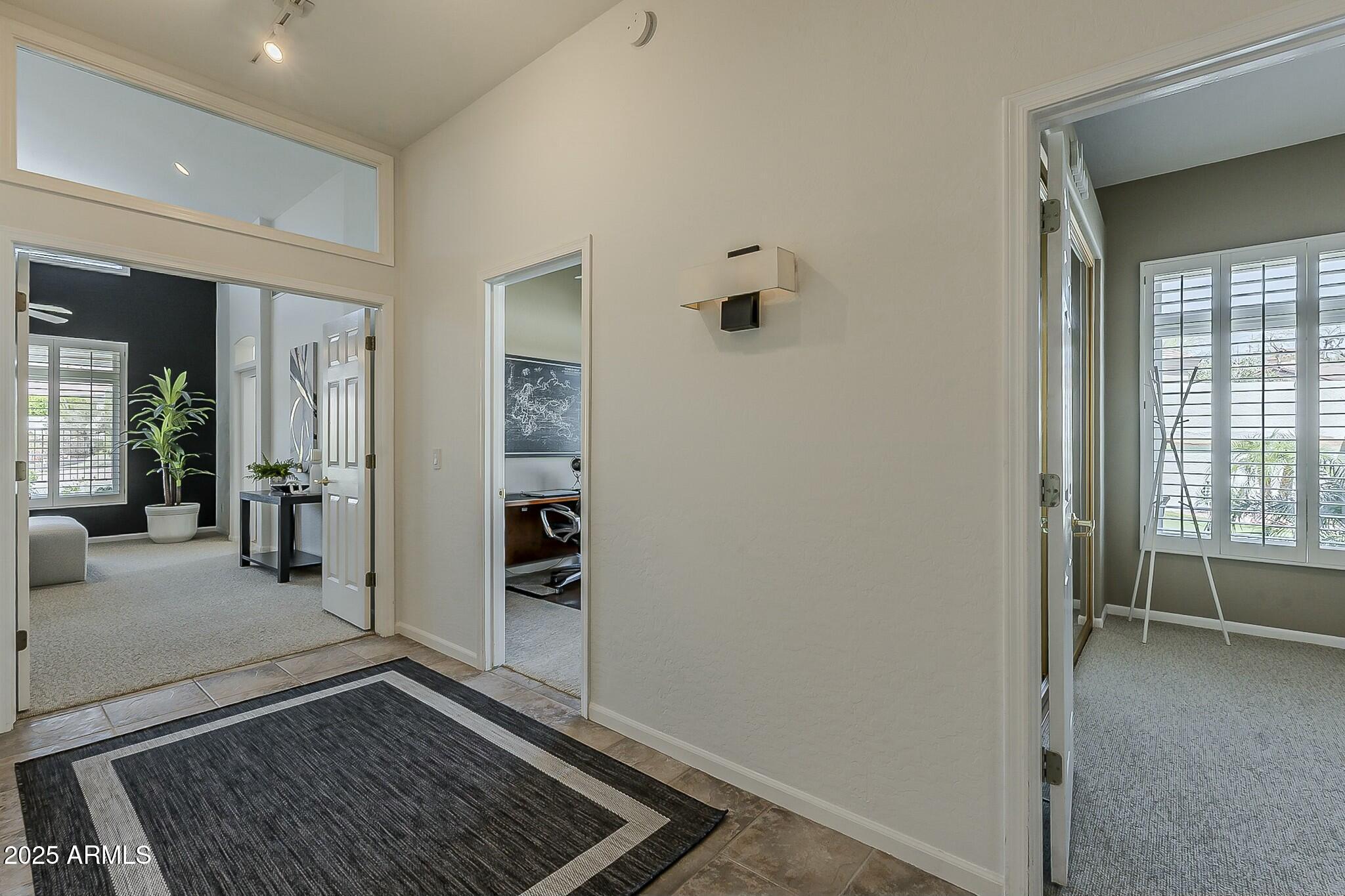 6334 East Viewmont Drive, Unit 29 Mesa, AZ 85215 - Photo 19 of 47 wooden floor with view of an empty room