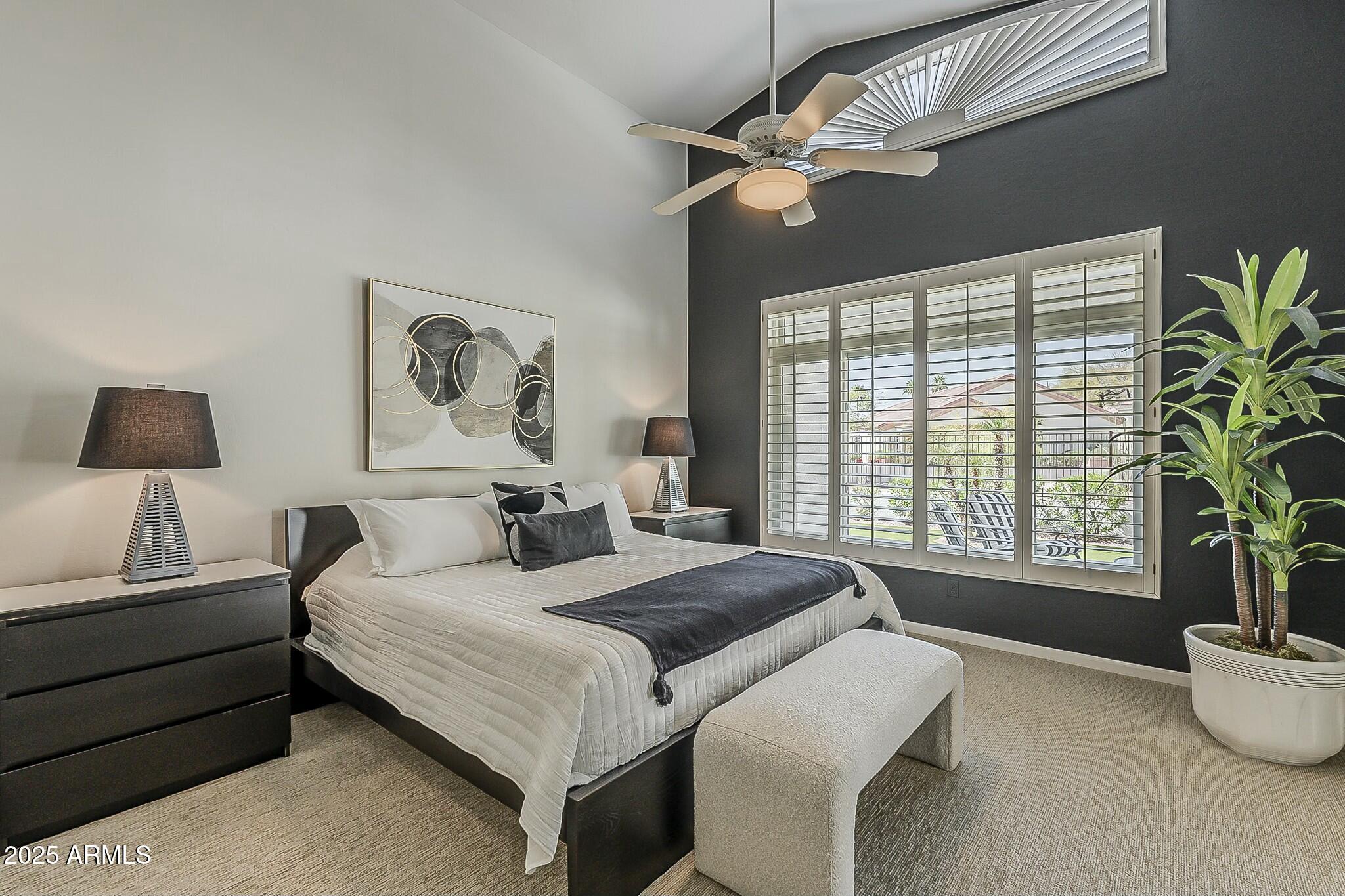 6334 East Viewmont Drive, Unit 29 Mesa, AZ 85215 - Photo 20 of 47 a bedroom with a large bed and a window