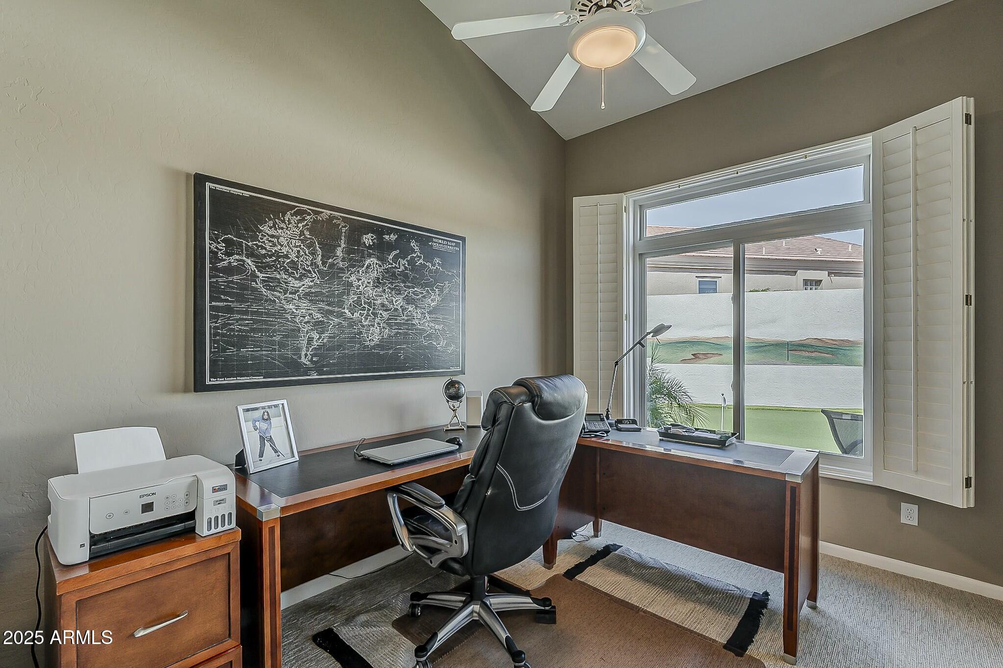 6334 East Viewmont Drive, Unit 29 Mesa, AZ 85215 - Photo 26 of 47 a view of a workspace with furniture and a window