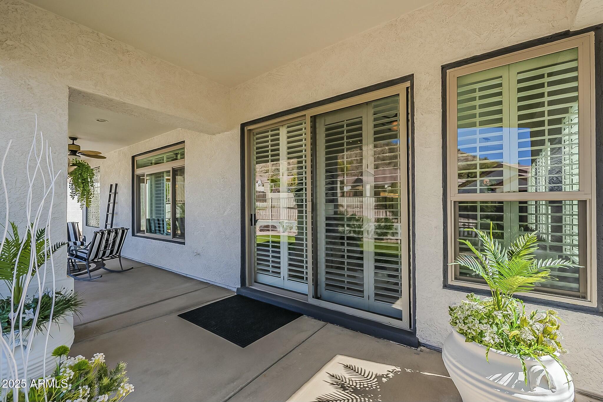 6334 East Viewmont Drive, Unit 29 Mesa, AZ 85215 - Photo 33 of 47 a view of balcony with a potted plant