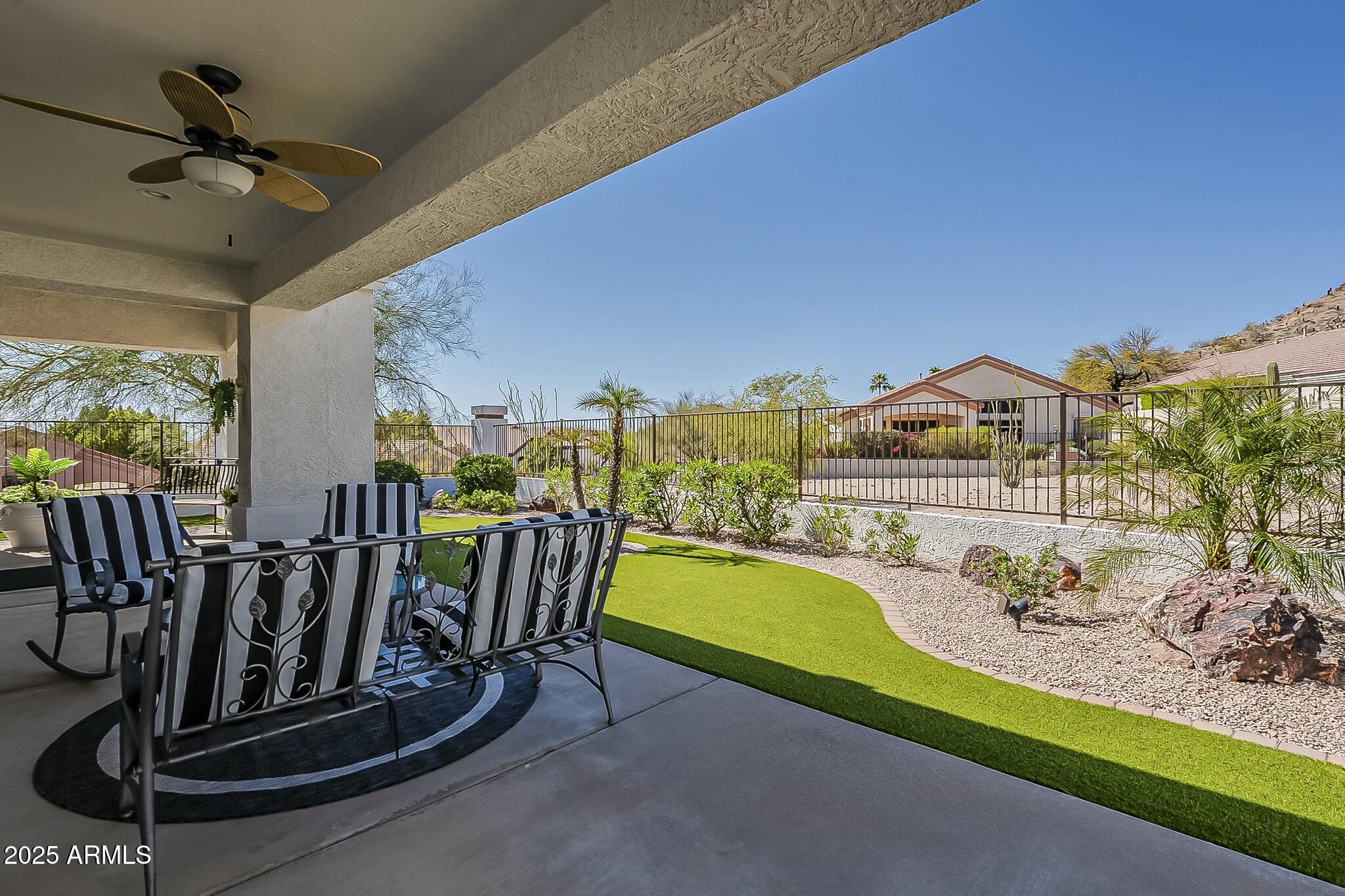 6334 East Viewmont Drive, Unit 29 Mesa, AZ 85215 - Photo 34 of 47 a view of a dining room with furniture window and outside view