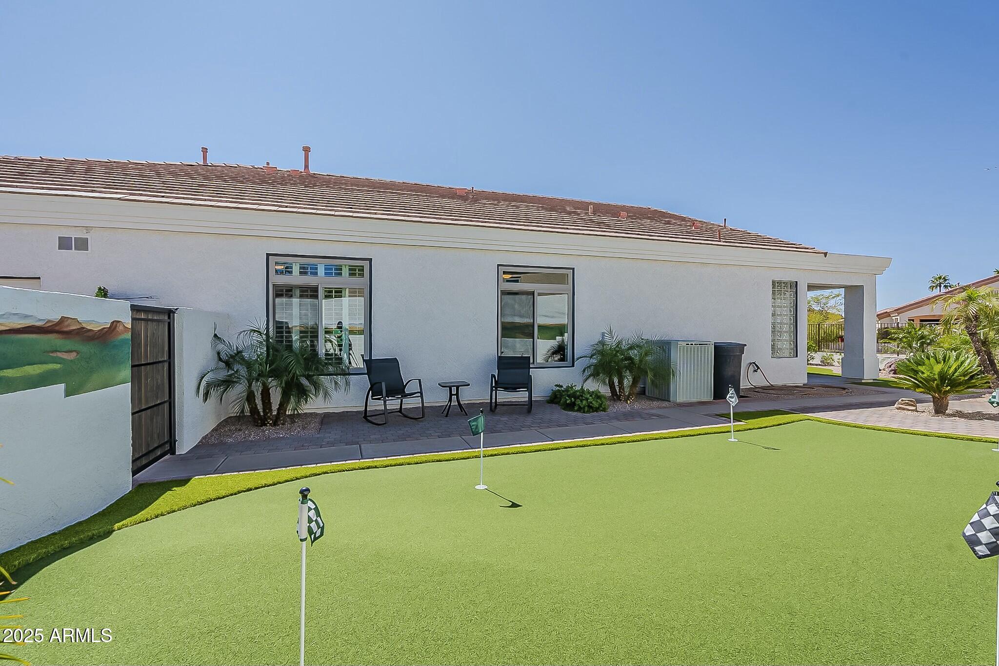 6334 East Viewmont Drive, Unit 29 Mesa, AZ 85215 - Photo 37 of 47 a view of a house with a patio