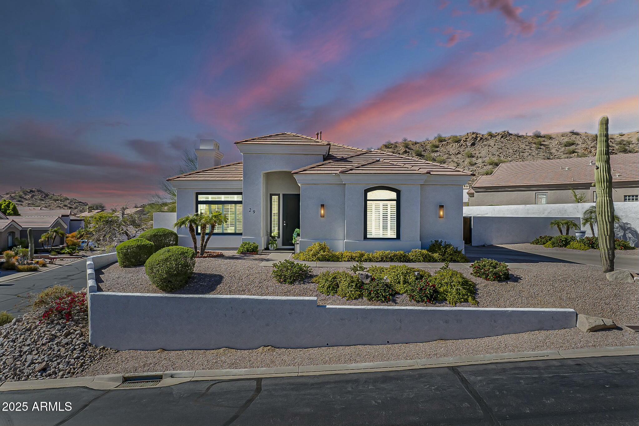 6334 East Viewmont Drive, Unit 29 Mesa, AZ 85215 - Photo 42 of 47 front view of a house with a garden