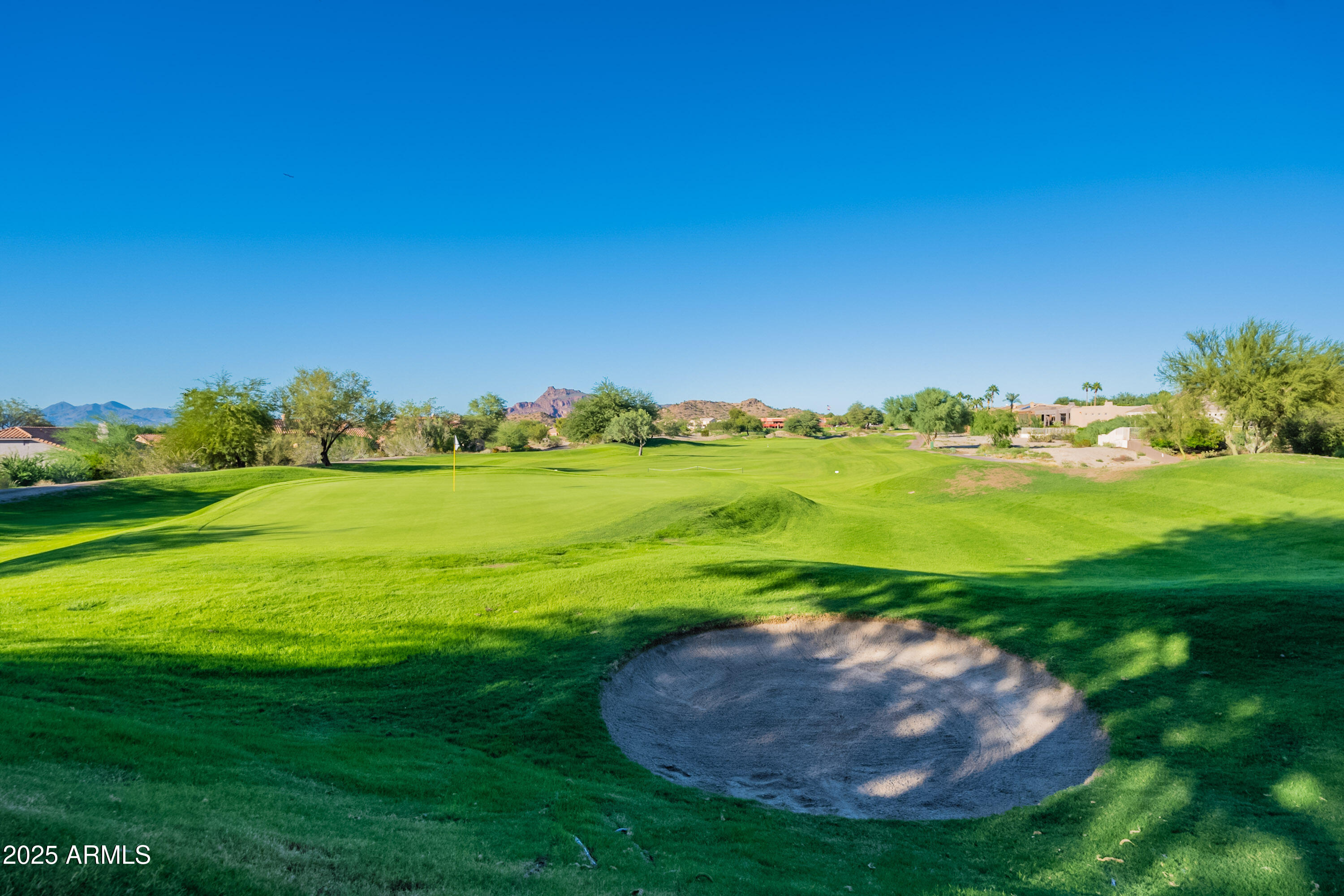 6334 East Viewmont Drive, Unit 29 Mesa, AZ 85215 - Photo 45 of 47 a view of a golf course with a big yard