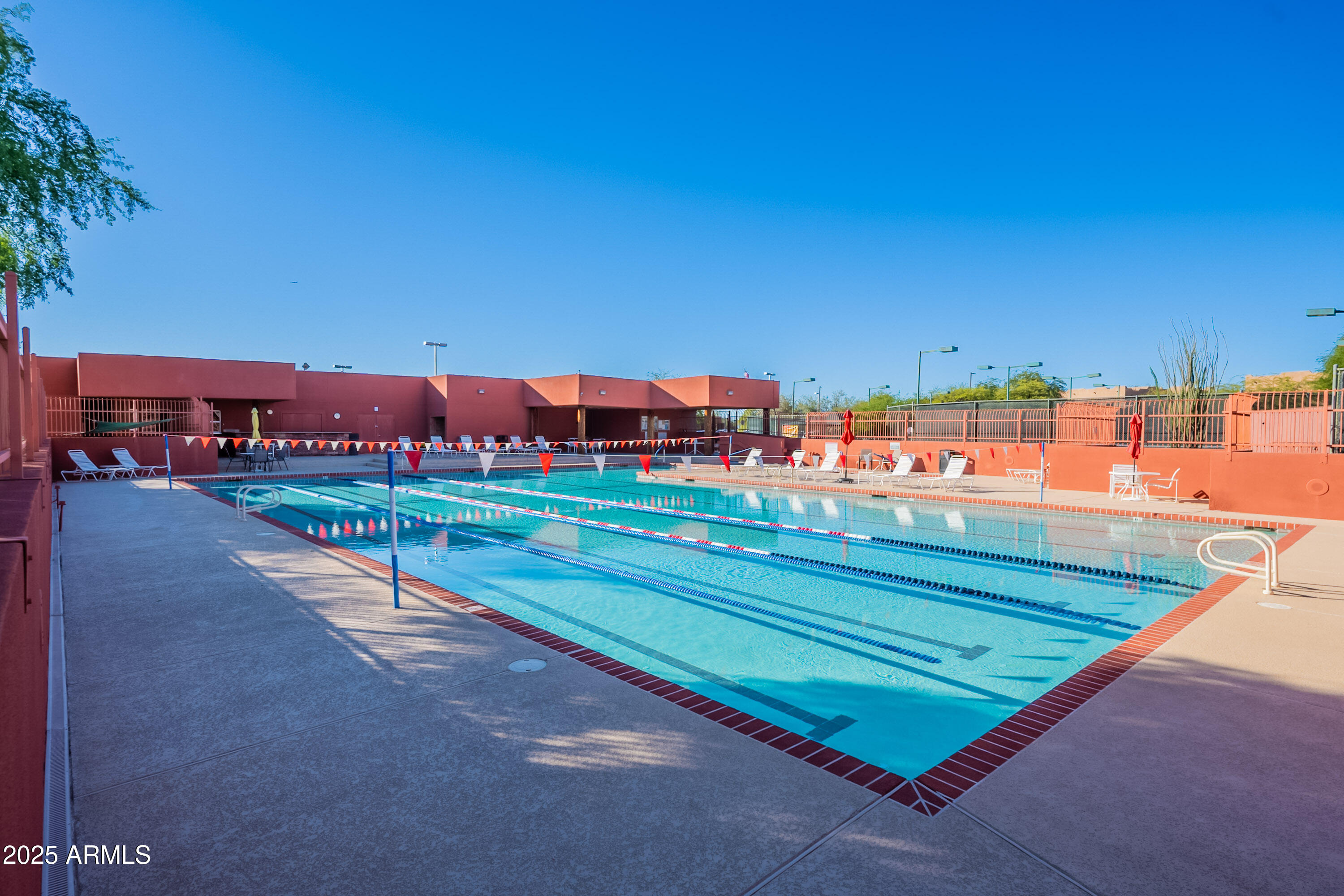 6334 East Viewmont Drive, Unit 29 Mesa, AZ 85215 - Photo 47 of 47 an outdoor view with a swimming pool and sitting space