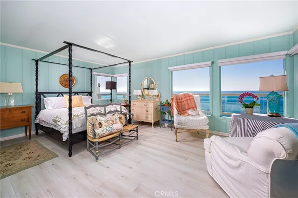 a bedroom with bed and window