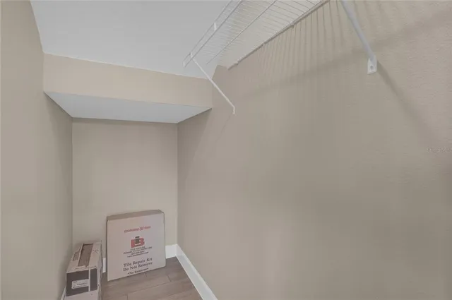 a view of a house with a yard and garage