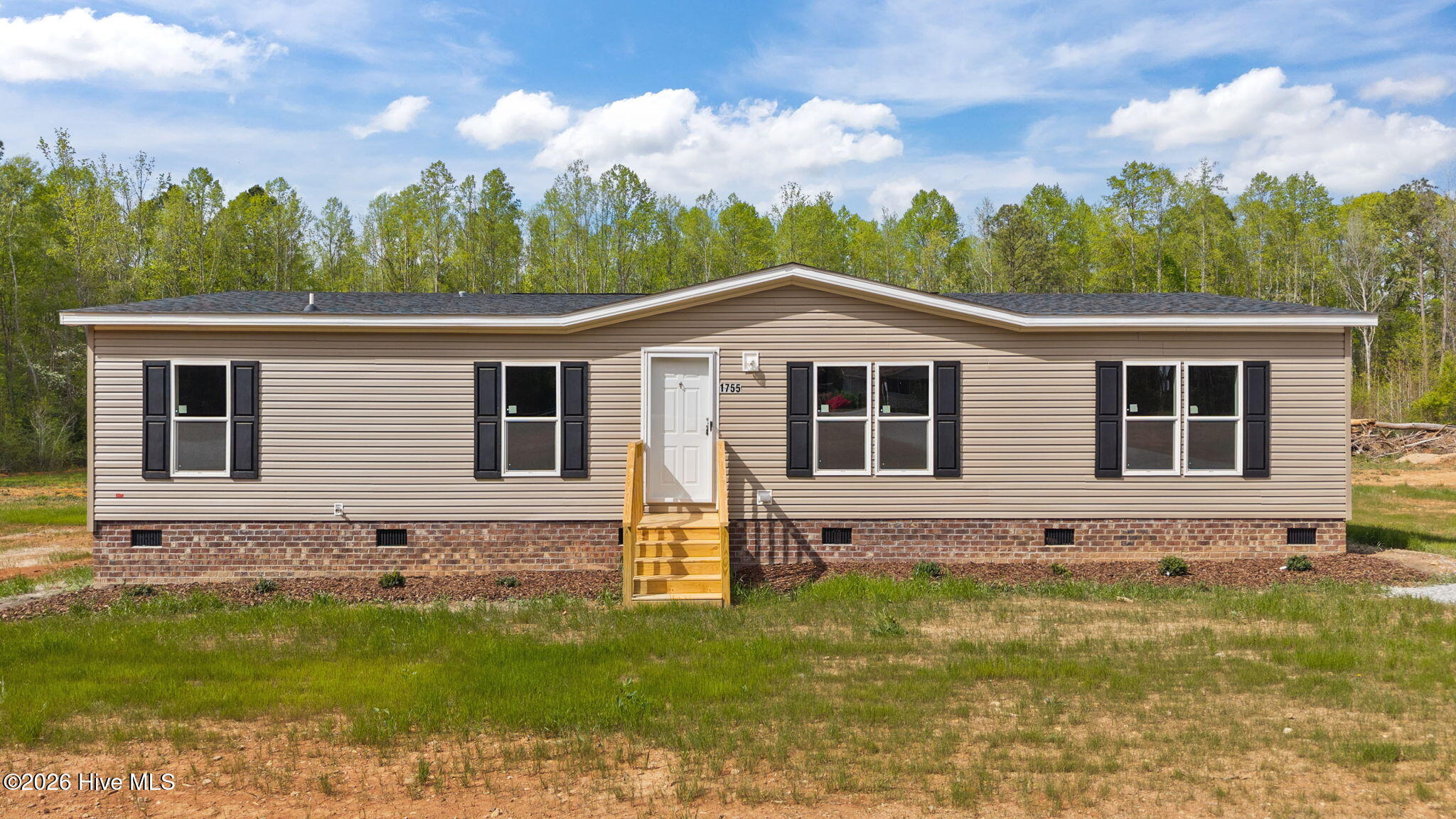1755 Lynch Road Hollister, NC 27844 - Photo 2 of 35 1-web-or-mls-DJI_20260406153648_0098_D