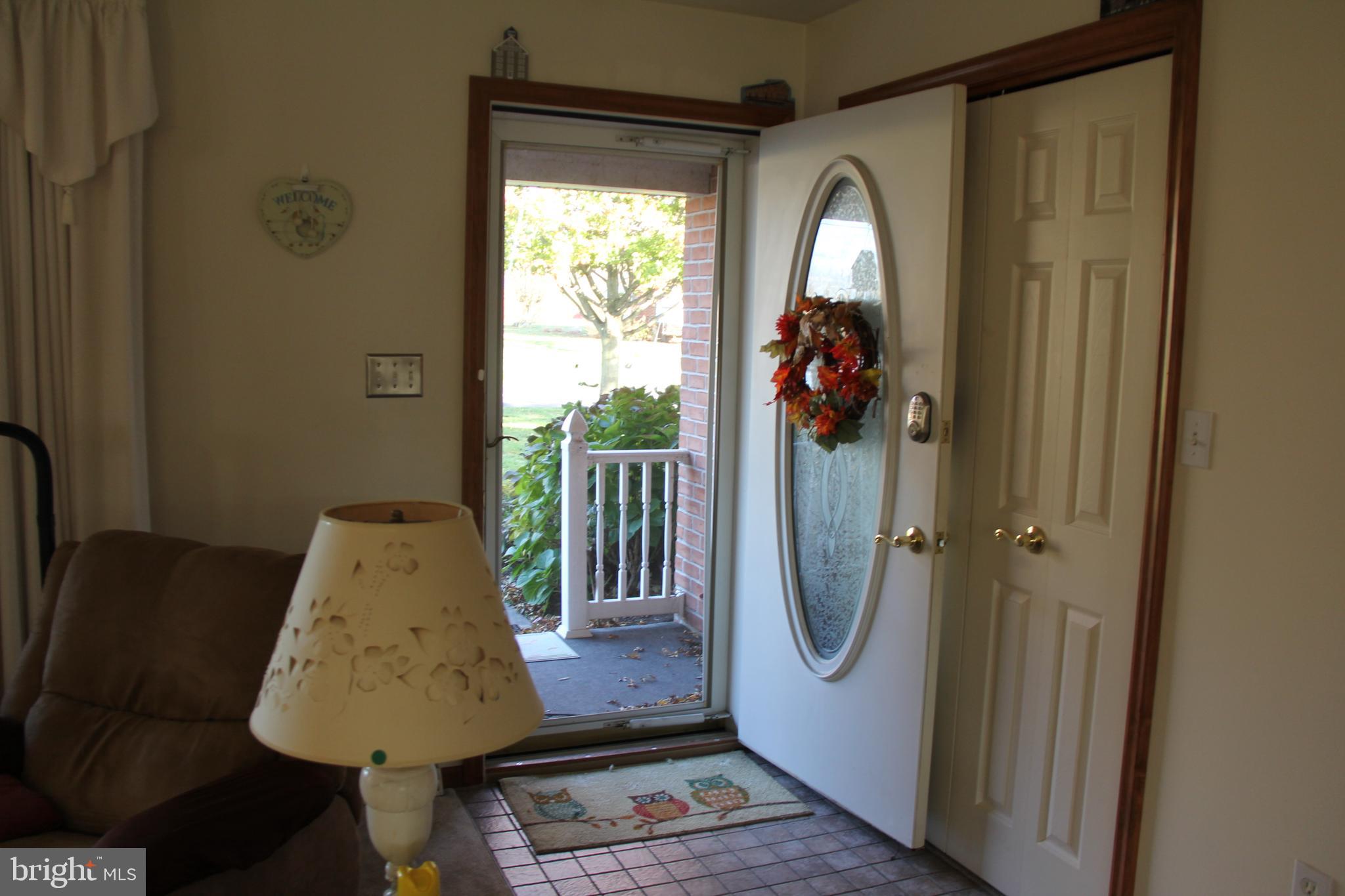 668 Snyder Hill Road Lititz, PA 17543 - Photo 11 of 32 a view of entryway and wooden floor