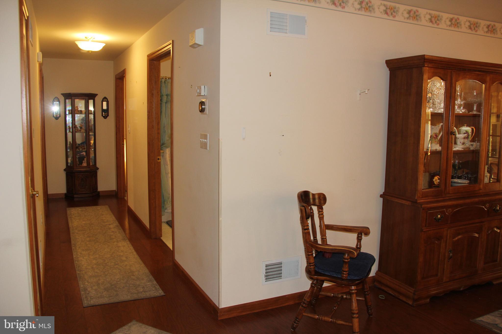668 Snyder Hill Road Lititz, PA 17543 - Photo 22 of 32 a view of a hallway with seating area